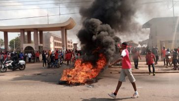 Angry NDC supporters block roads, burn tyres in protest against EC in Kumasi